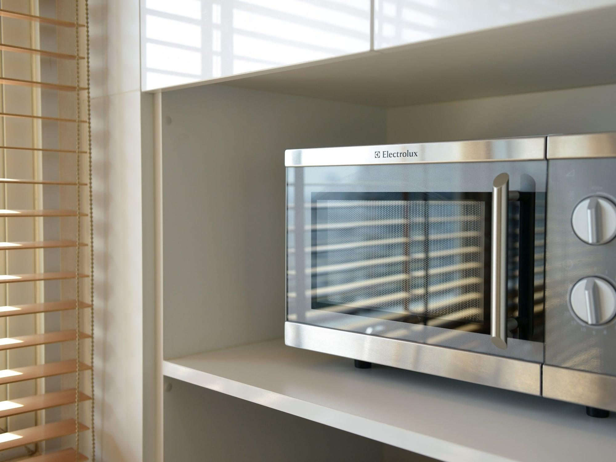 Grande Centre Point Ploenchit Hotel Bangkok Ngoại thất bức ảnh A microwave oven