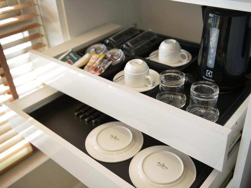 Grande Centre Point Ploenchit Hotel Bangkok Phòng bức ảnh A drawer with a divider